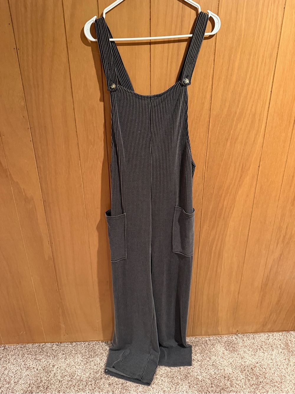 Ribbed Black Wide-Leg Pinafore Jumpsuit with Front Pockets